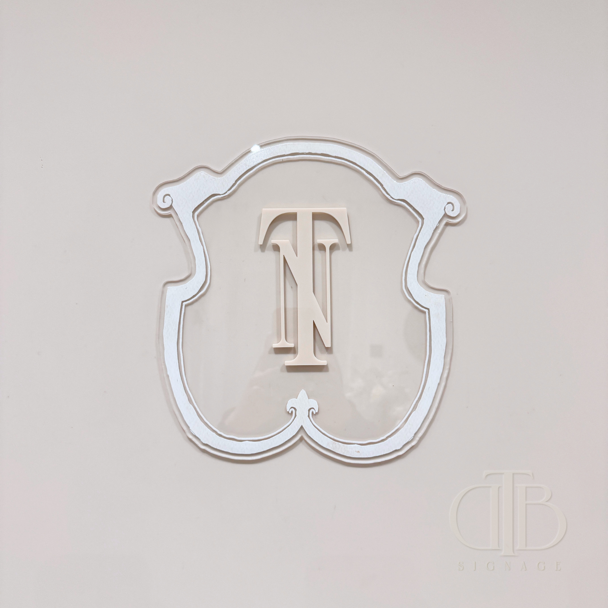 Luxury crest in Beige frame UV printed on clear acrylic, front view