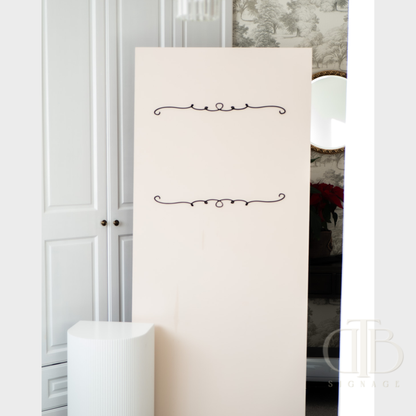 White standing mirror with decorative elements in a room setting