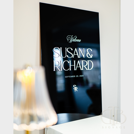 Decorative mirror with personalized text on a blurred background