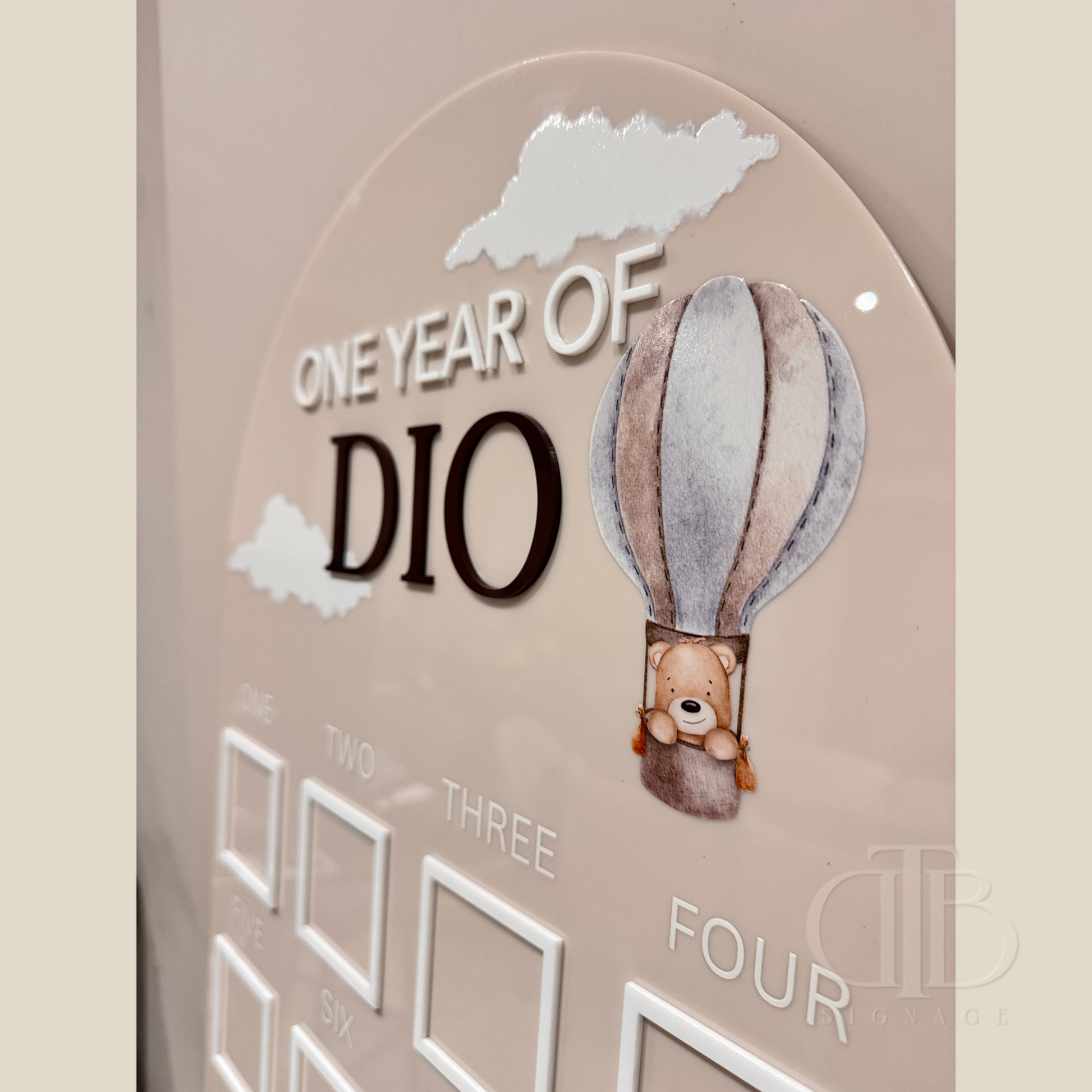 One year photo frame with acrylic gloss shine, close up view showing raised effect of the UV print