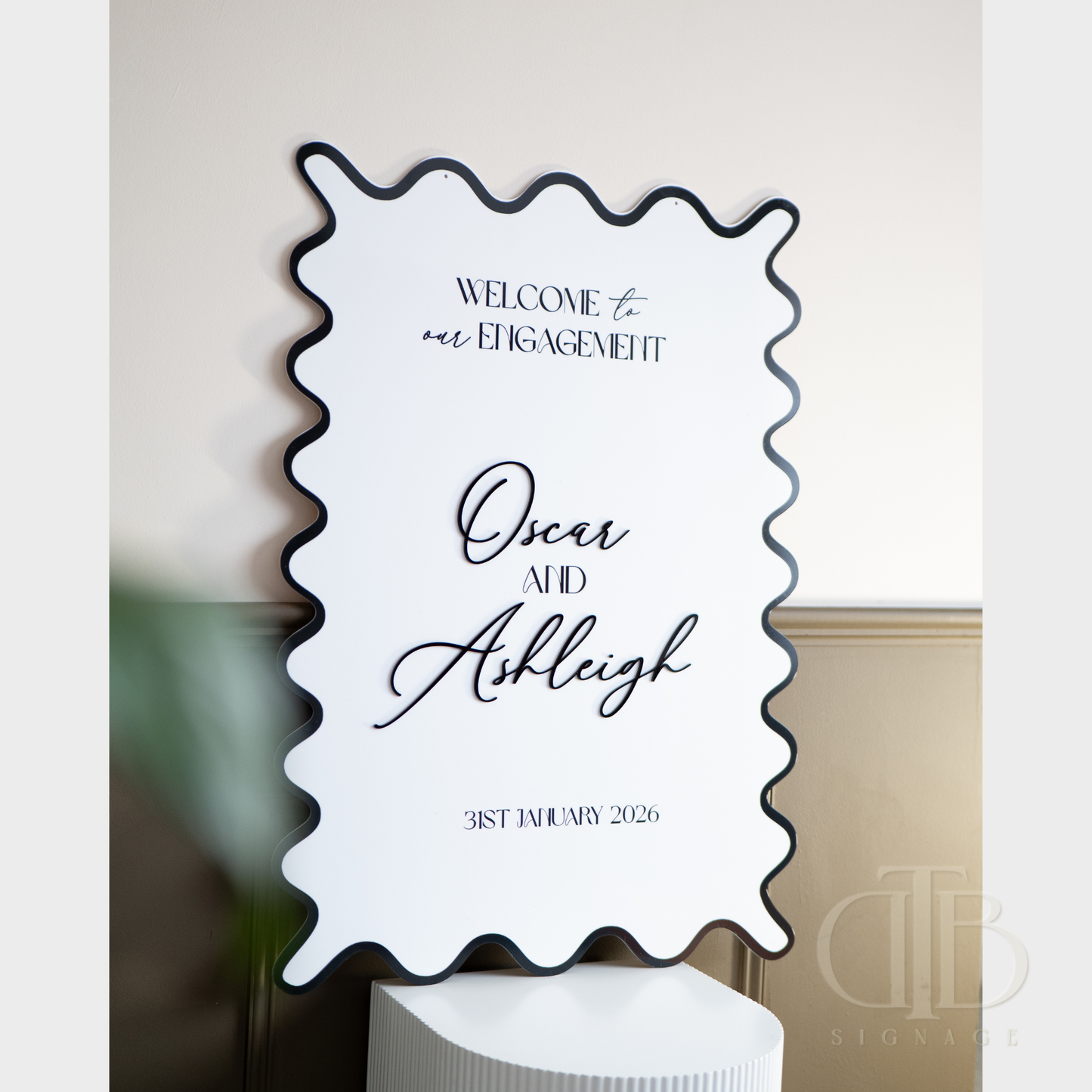 Decorative sign with personalized text on a white background