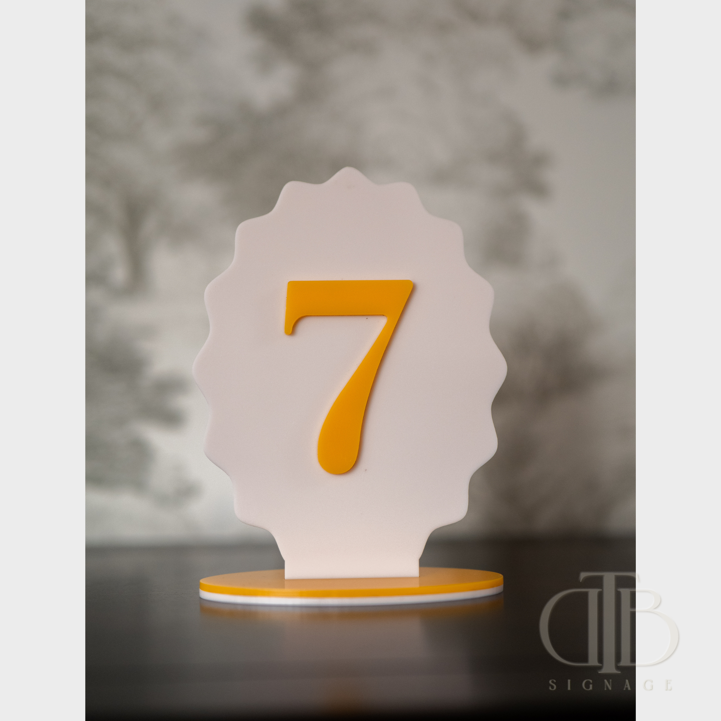 Decorative table number with the number 7 on a gray background