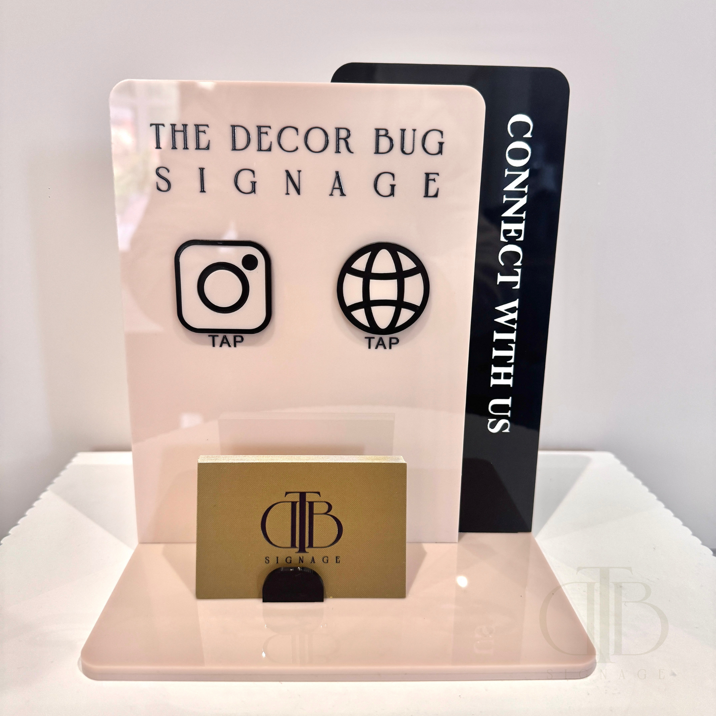 Customisable acrylic Social Media Board with Whatsapp and Instagram icons with NFC tap technology on a white surface, also have a slot of holding Business Cards, fully made of premium acrylics. 