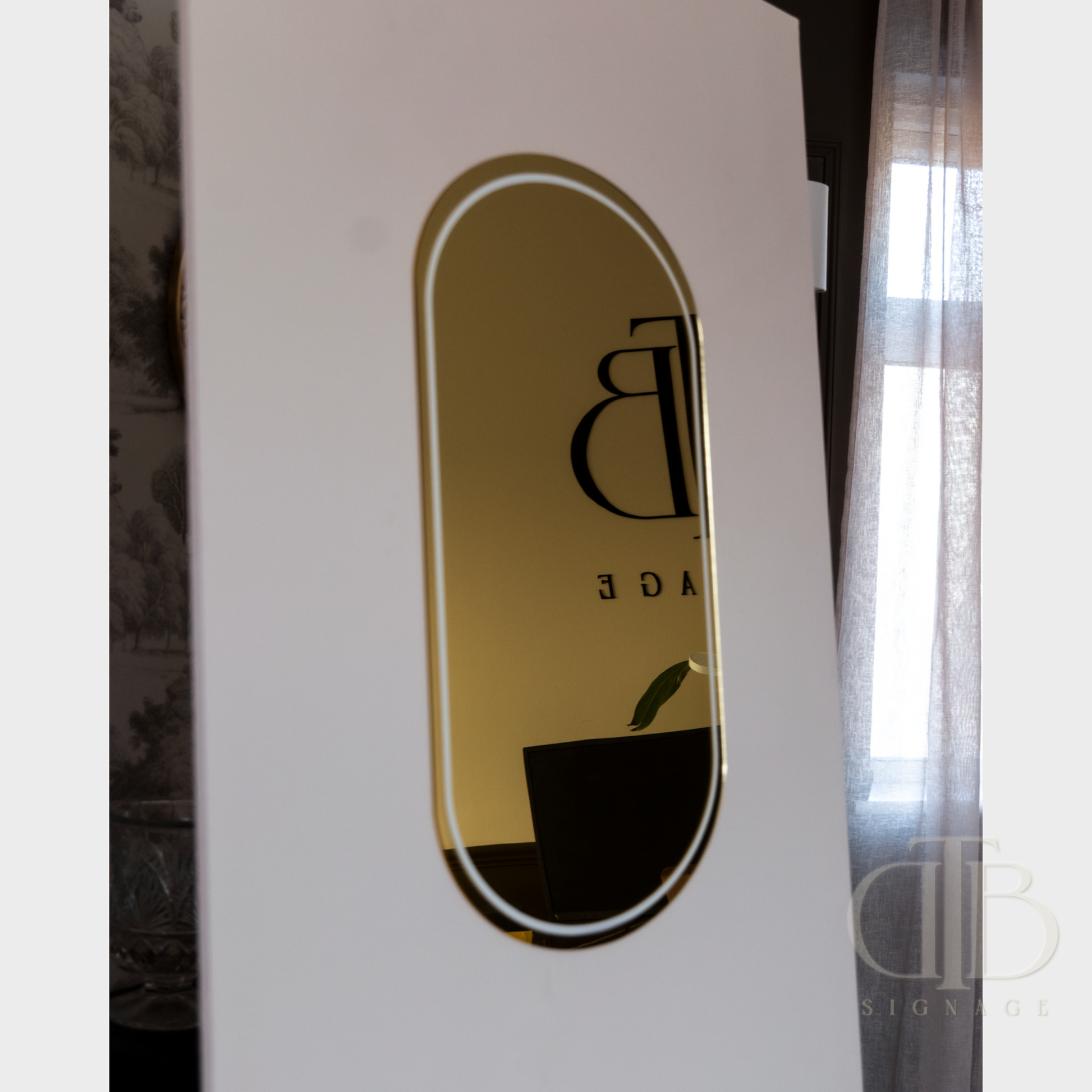 White product with gold and black logo on a white background