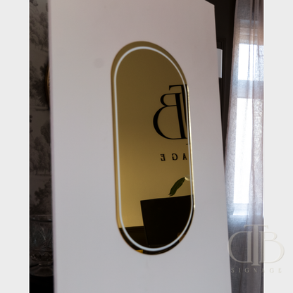 White product with gold and black logo on a white background