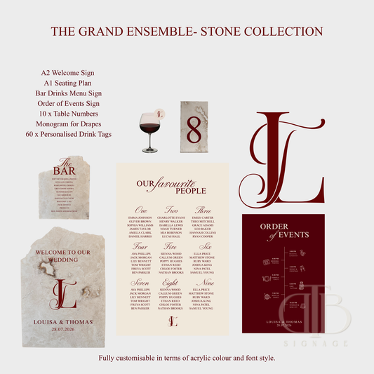 Collection of wedding stationery items with monogram 'L' on a white background