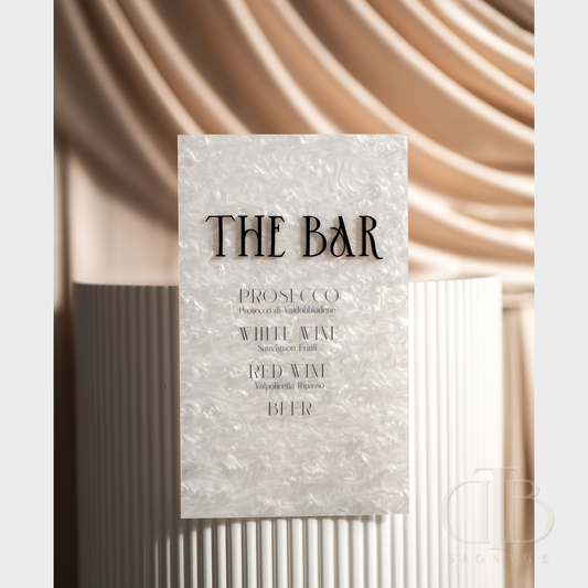 Menu card for 'The Bar' with drink options on a textured background