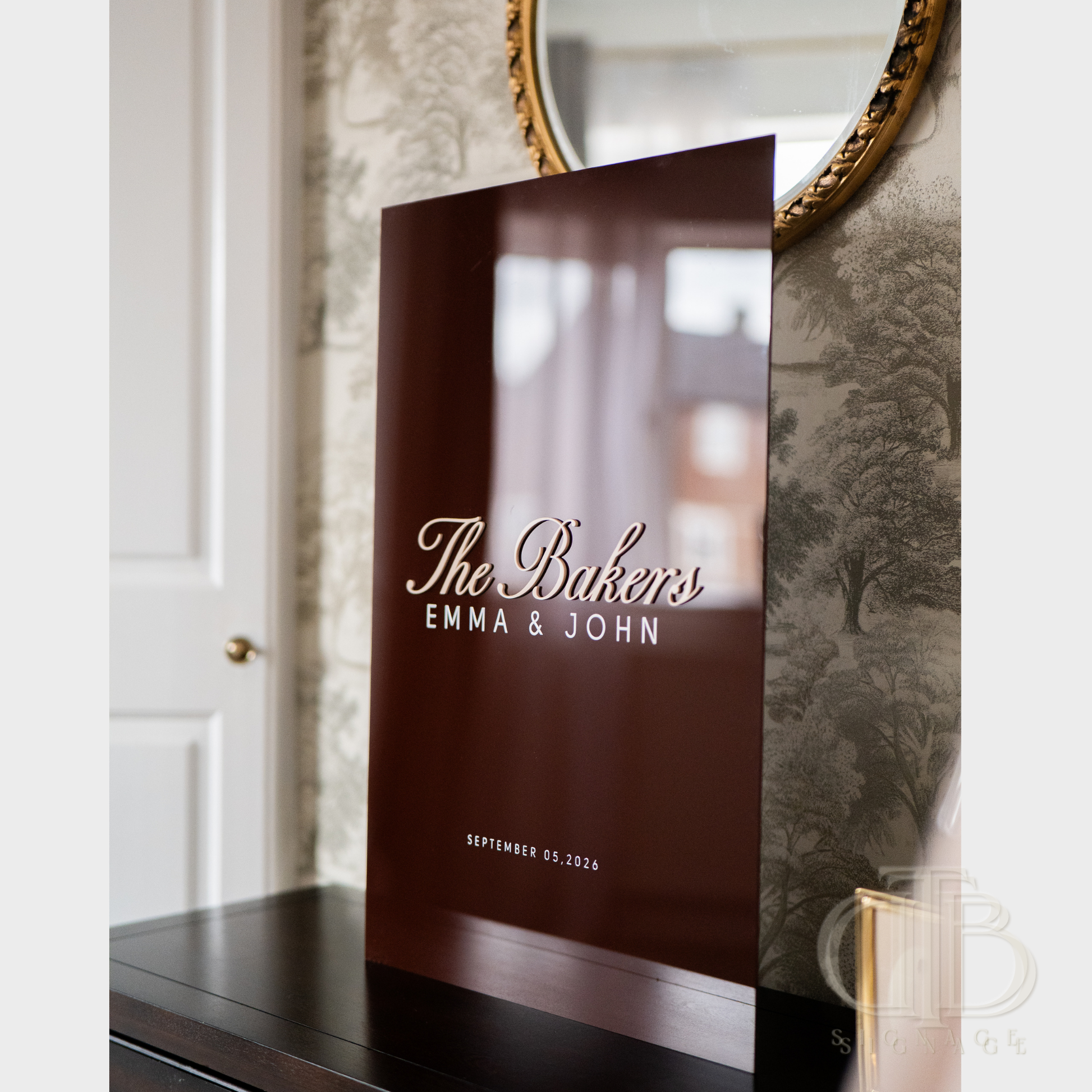 Personalized menu cover with 'The Bakers Emma & John' on a decorative wall background