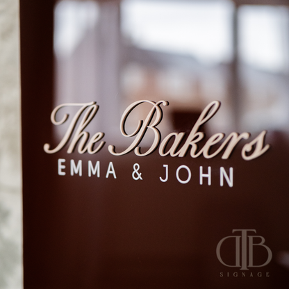 Decorative glass with 'The Bakers EMMA & JOHN' text and 'DTB SIGNAGE' logo.