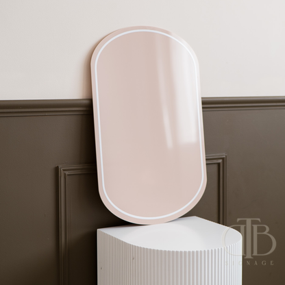 Beige wall acrylic signage on a white pedestal against a brown paneled wall