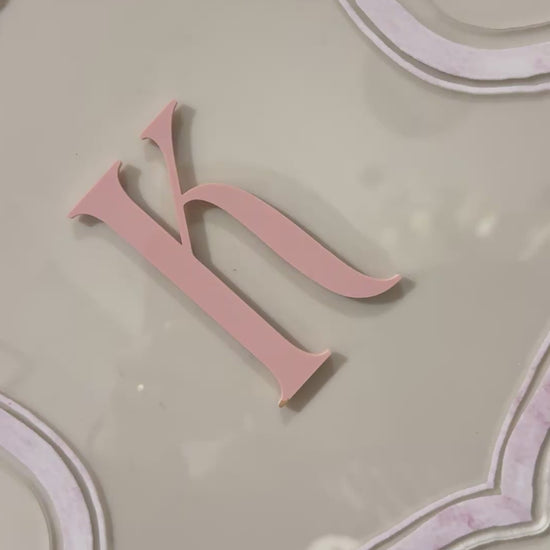 Luxury crest with baby pink frame UV printed and acrylic initial K in baby pint, video clip