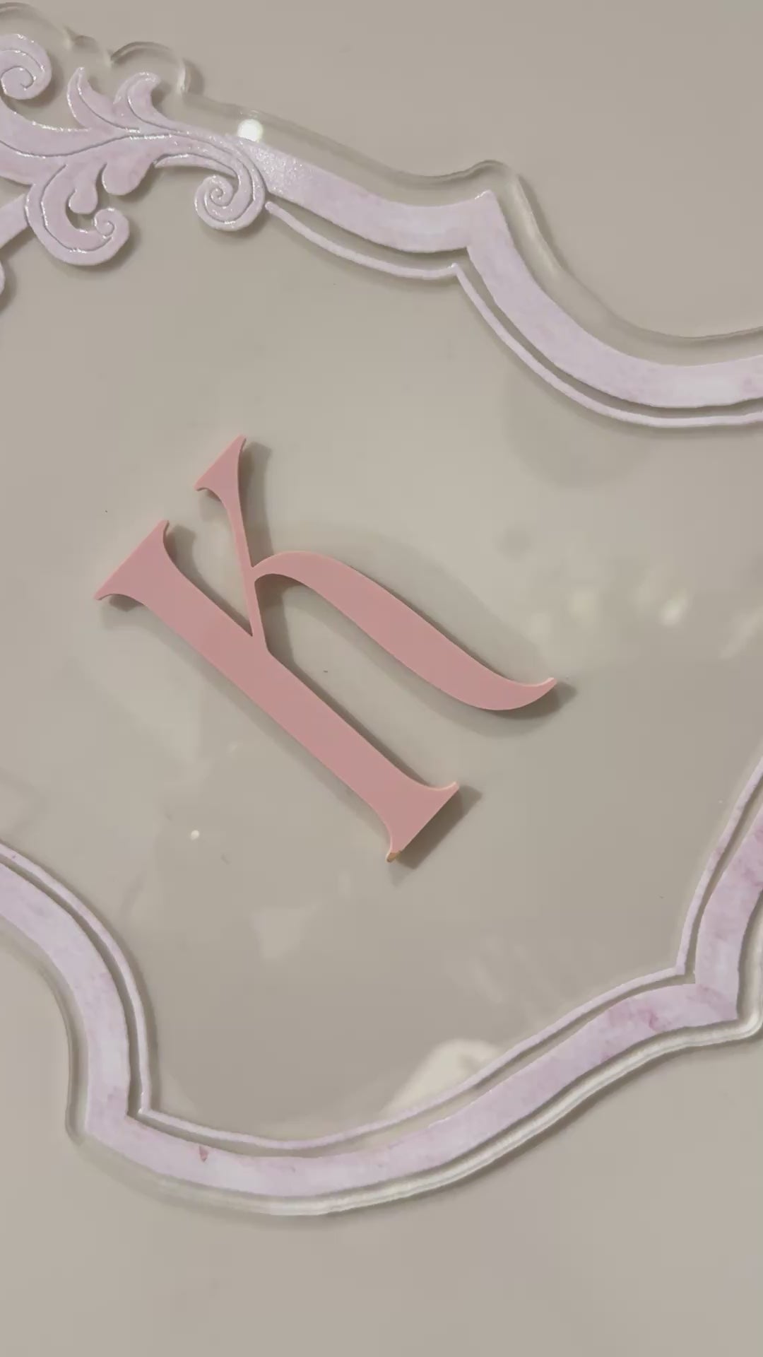 Luxury crest with baby pink frame UV printed and acrylic initial K in baby pint, video clip